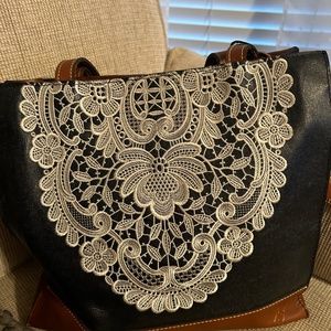 Patricia Nash navy and lace handbag
